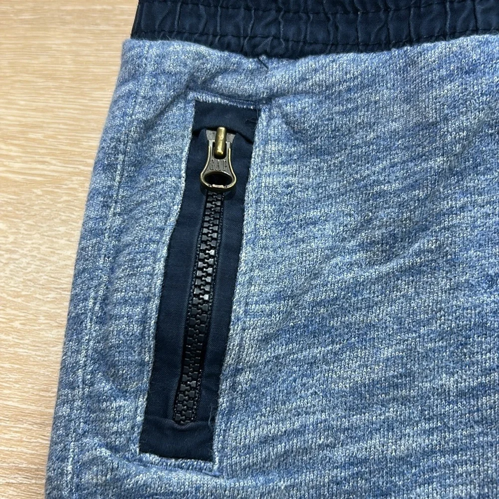 Baby Gap soft blue shorts with zipper pockets accented with dark blue! Size 4